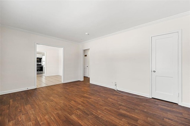 3723 Glenwood Rd, Decatur, GA 30032 - empty room featuring ornamental molding, wood finished floors, and baseboards