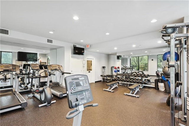 exercise room featuring visible vents and recessed lighting