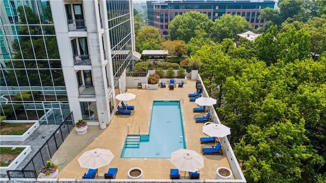 exterior space with a patio area and a community pool