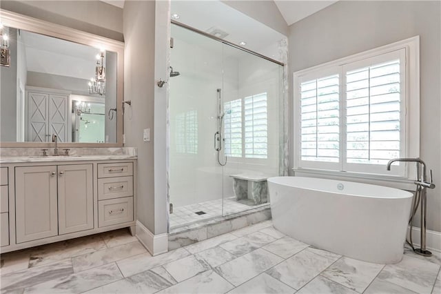 bathroom with baseboards, marble finish floor, and vanity