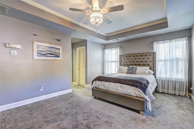 bedroom featuring carpet flooring, ceiling fan, and ornamental molding