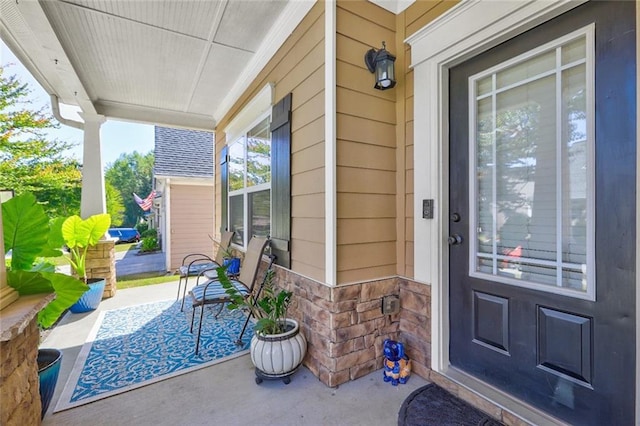 entrance to property with a porch