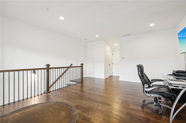 office with dark hardwood / wood-style flooring