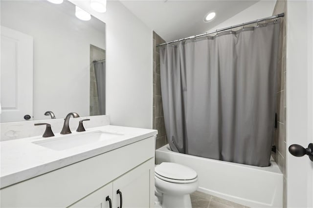 full bathroom with vanity, toilet, tile patterned flooring, and shower / bath combo