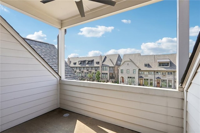 balcony featuring ceiling fan