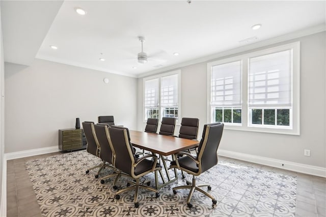 dining room with ornamental molding, light tile patterned floors, and ceiling fan