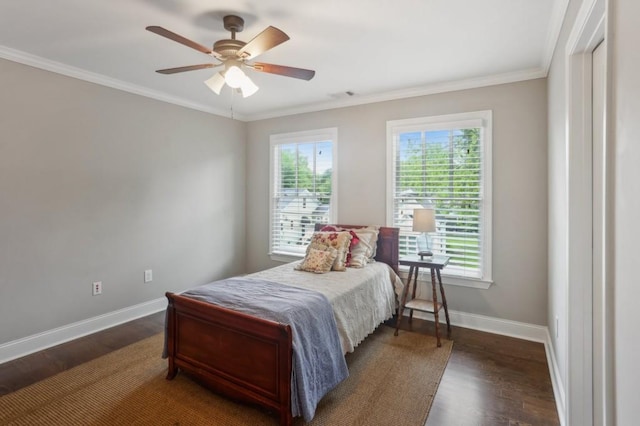 bedroom with baseboards, dark wood-type flooring, ornamental molding, and a ceiling fan