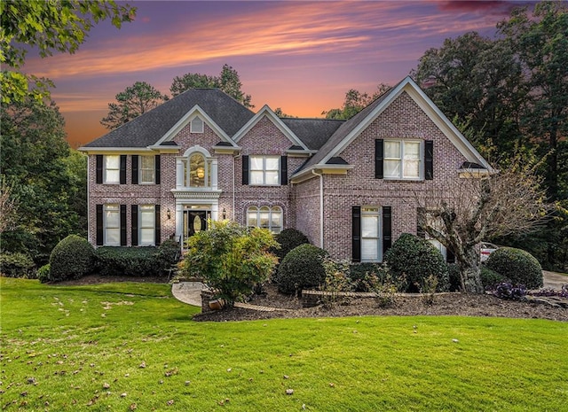 view of front of home featuring a yard