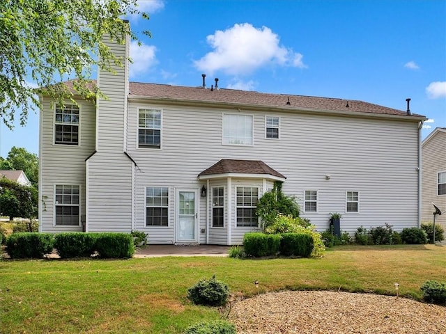 3725 Crescent Walk Ln, Suwanee, GA 30024 - back of house featuring a chimney, a lawn, and a patio area