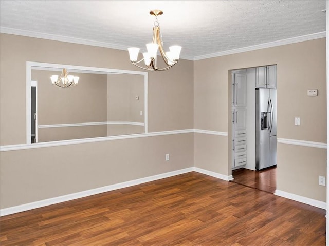 3725 Crescent Walk Ln, Suwanee, GA 30024 - empty room with a chandelier, dark wood-style floors, ornamental molding, and a textured ceiling