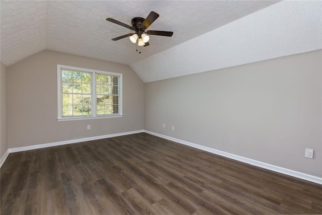 216 Hickory Way, Canton, GA 30115 - bonus room featuring a textured ceiling, dark wood finished floors, vaulted ceiling, and a ceiling fan