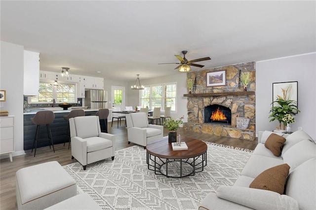 216 Hickory Way, Canton, GA 30115 - living room featuring ceiling fan, plenty of natural light, and light wood-type flooring
