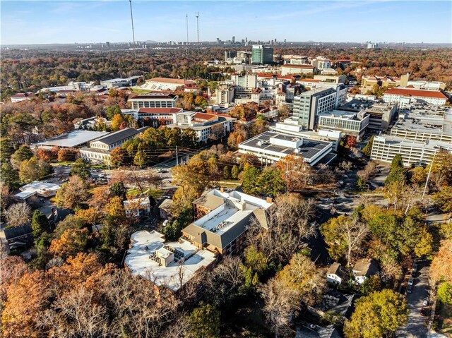 birds eye view of property with a city view