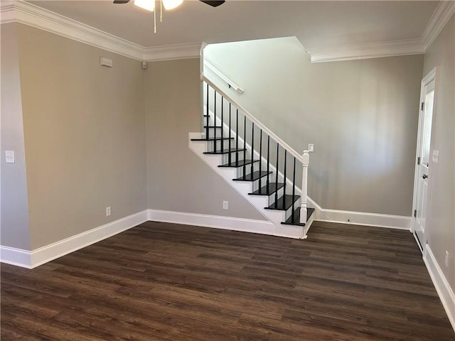 entrance foyer featuring dark hardwood / wood-style floors, ceiling fan, and crown molding