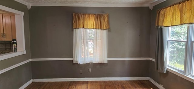 unfurnished dining area featuring hardwood / wood-style flooring