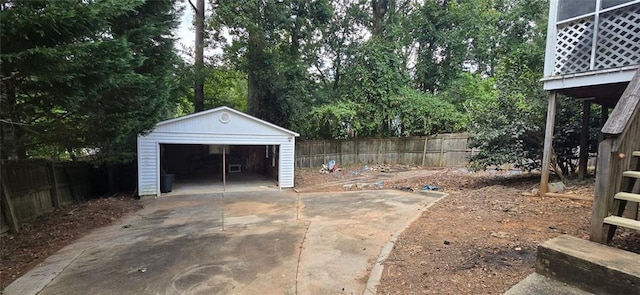 exterior space featuring an outbuilding and a garage