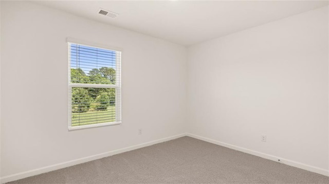 empty room featuring carpet flooring