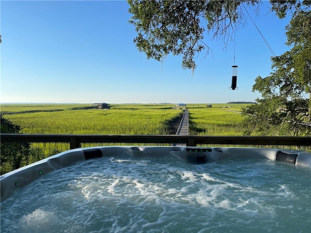 exterior space with a hot tub