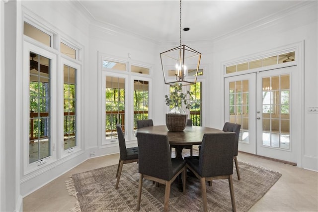 sunroom / solarium with a chandelier, french doors, and a healthy amount of sunlight