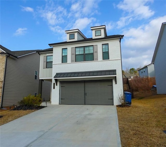 view of front of property featuring driveway, metal roof, an attached garage, a standing seam roof, and brick siding