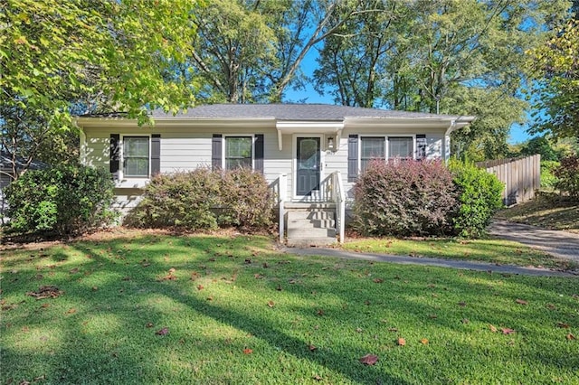 view of front of house with a front lawn