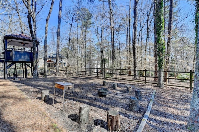 view of yard featuring fence