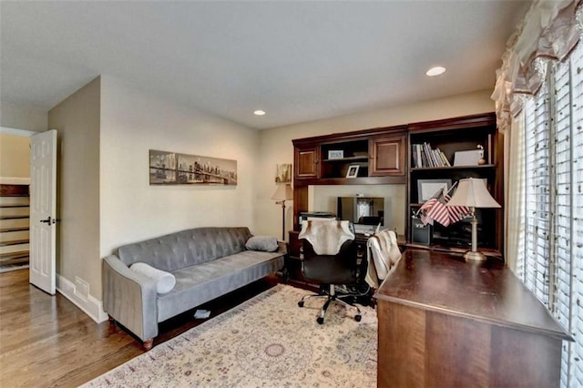 office area with baseboards, plenty of natural light, dark wood finished floors, and recessed lighting