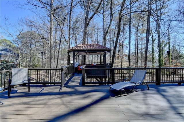 wooden deck with a gazebo