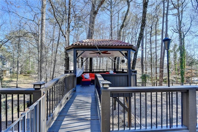 wooden deck featuring a gazebo