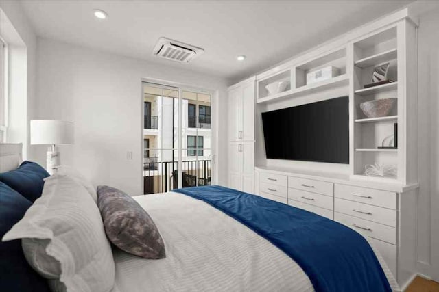 bedroom with visible vents and recessed lighting