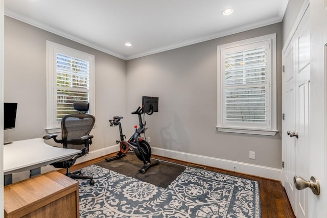 office area with dark hardwood / wood-style flooring and ornamental molding