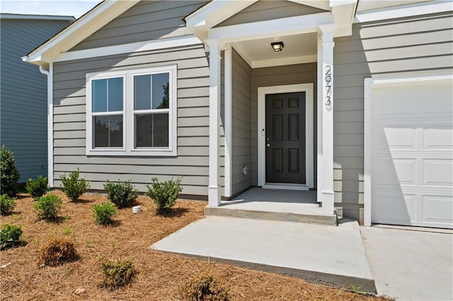 entrance to property with a garage