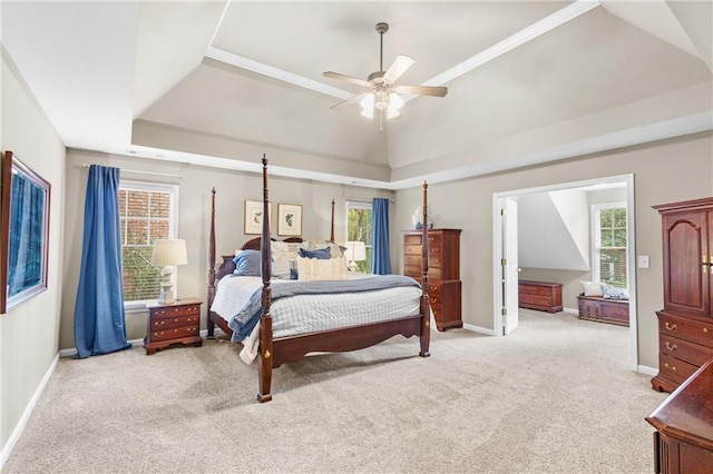 4840 Spring Park Cir, Suwanee, GA 30024 - bedroom featuring light colored carpet, a raised ceiling, and a ceiling fan