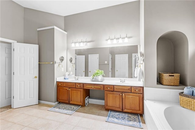 4840 Spring Park Cir, Suwanee, GA 30024 - full bath featuring double vanity, a bath, and tile patterned flooring