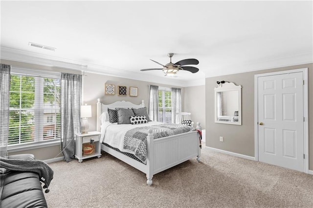 4840 Spring Park Cir, Suwanee, GA 30024 - bedroom with ornamental molding, light carpet, and a ceiling fan