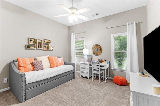 4840 Spring Park Cir, Suwanee, GA 30024 - living area featuring carpet, plenty of natural light, and a ceiling fan