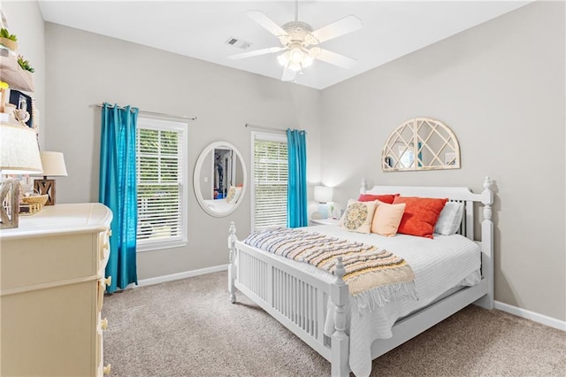 4840 Spring Park Cir, Suwanee, GA 30024 - carpeted bedroom featuring baseboards and a ceiling fan