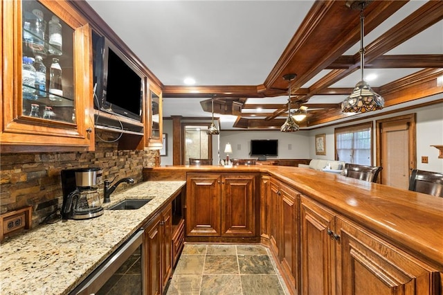 4840 Spring Park Cir, Suwanee, GA 30024 - kitchen with stone finish floors, beverage cooler, glass insert cabinets, backsplash, and a ceiling fan