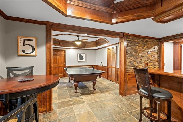4840 Spring Park Cir, Suwanee, GA 30024 - game room with a raised ceiling, crown molding, ceiling fan, a bar, and stone finish flooring