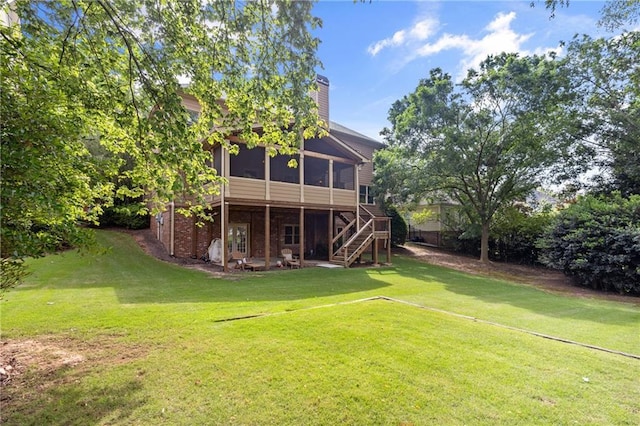 4840 Spring Park Cir, Suwanee, GA 30024 - view of green lawn featuring a sunroom and stairway