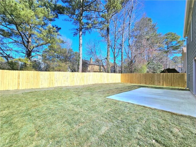 view of yard featuring a fenced backyard