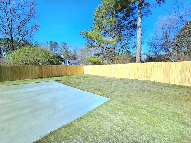 view of yard featuring a fenced backyard