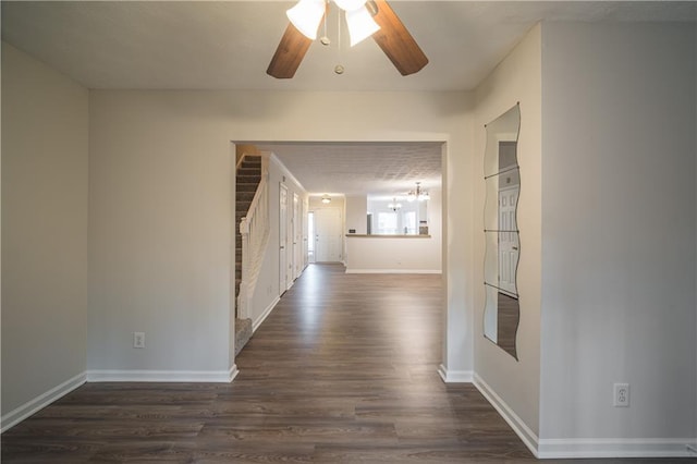 corridor with dark wood-type flooring