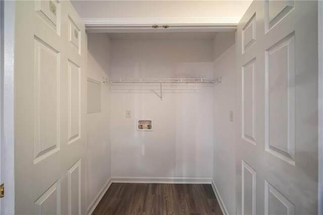 washroom featuring hookup for a washing machine and dark hardwood / wood-style floors