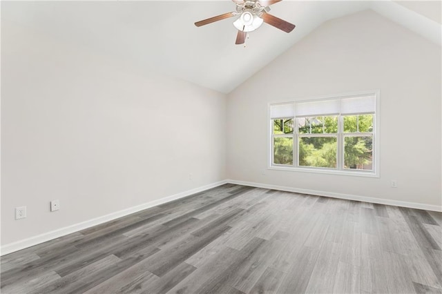 2957 Smith Ridge Trce, Peachtree Corners, GA 30071 - empty room featuring ceiling fan, baseboards, wood finished floors, and high vaulted ceiling
