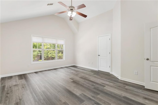2957 Smith Ridge Trce, Peachtree Corners, GA 30071 - empty room with a ceiling fan, wood finished floors, high vaulted ceiling, and baseboards