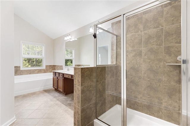 2957 Smith Ridge Trce, Peachtree Corners, GA 30071 - full bathroom with vanity, a shower stall, vaulted ceiling, a bath, and tile patterned floors