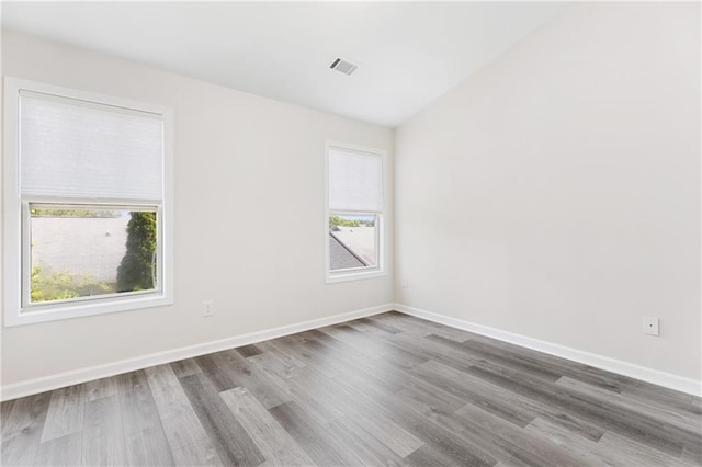 2957 Smith Ridge Trce, Peachtree Corners, GA 30071 - unfurnished room featuring wood finished floors and baseboards