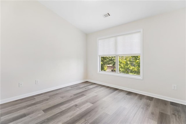 2957 Smith Ridge Trce, Peachtree Corners, GA 30071 - empty room featuring wood finished floors and baseboards