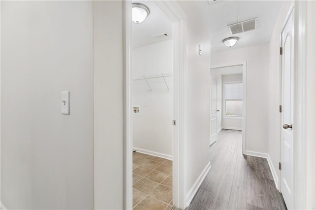 2957 Smith Ridge Trce, Peachtree Corners, GA 30071 - hallway featuring attic access, baseboards, and wood finished floors